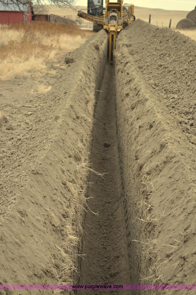 image for item C3043 2010 Wolfe Man 8000 wheel trencher