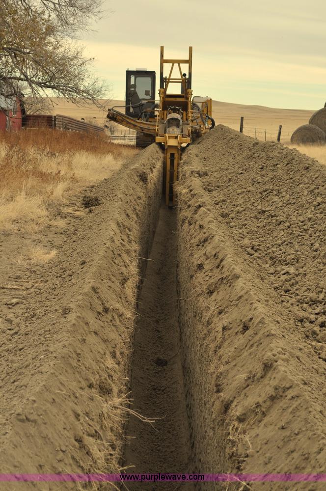 image for item C3043 2010 Wolfe Man 8000 wheel trencher