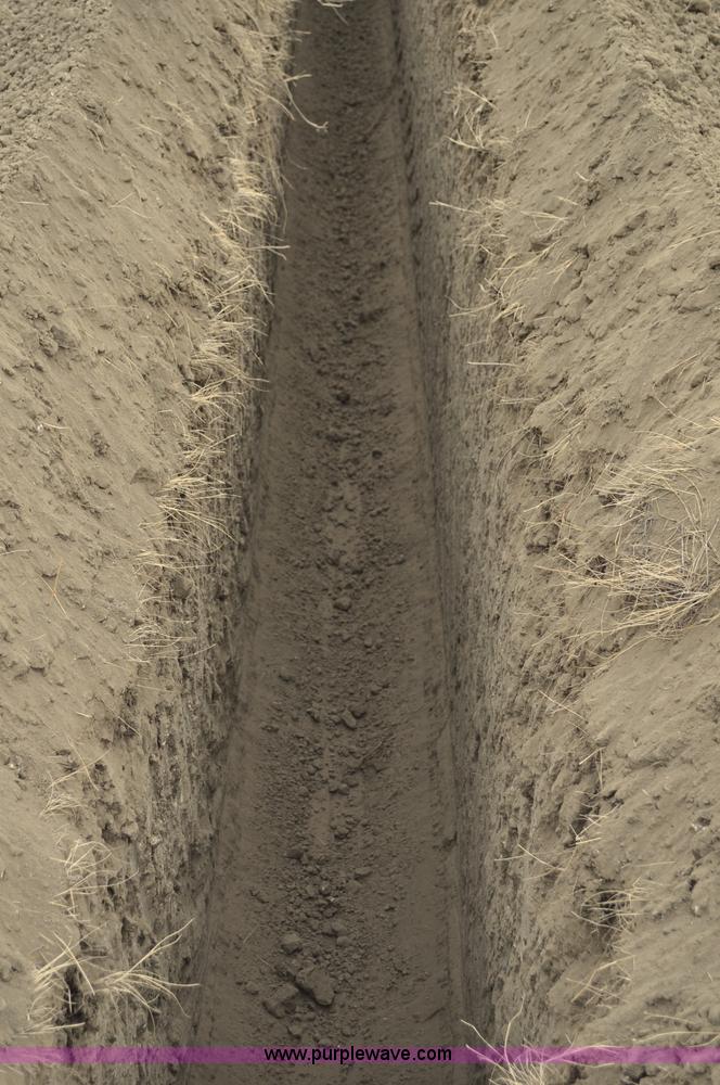 image for item C3043 2010 Wolfe Man 8000 wheel trencher