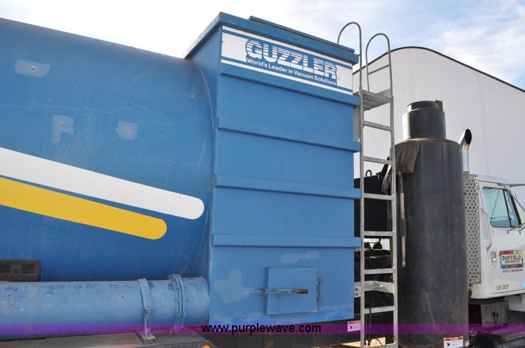 image for item C3053 1999 IHC 2674 vac truck