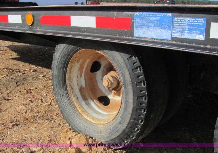 image for item C3107 1995 Redi Haul 25' flat bed trailer