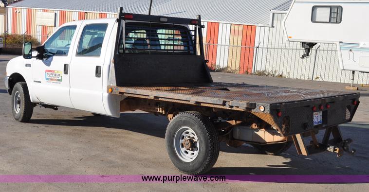 image for item C3129 2002 Ford F350 XL Super Duty flatbed truck