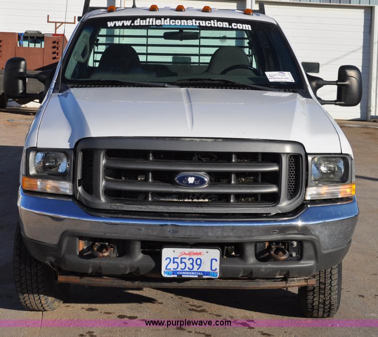 image for item C3129 2002 Ford F350 XL Super Duty flatbed truck