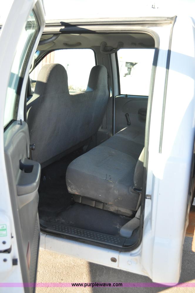 image for item C3129 2002 Ford F350 XL Super Duty flatbed truck