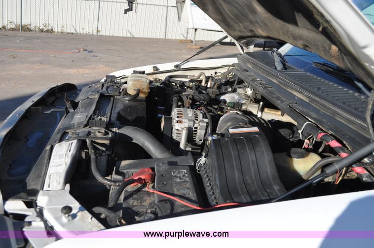 image for item C3129 2002 Ford F350 XL Super Duty flatbed truck