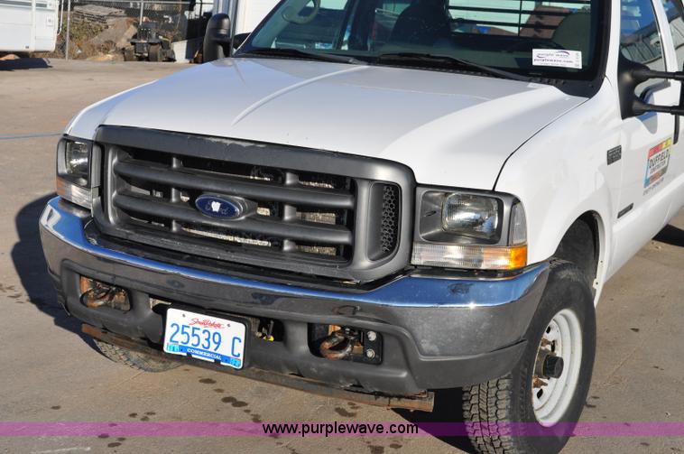 image for item C3129 2002 Ford F350 XL Super Duty flatbed truck