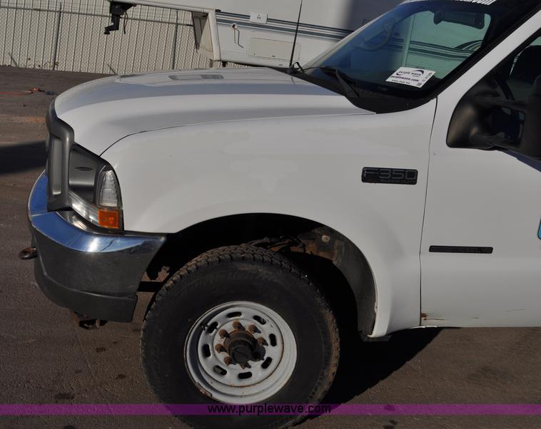 image for item C3129 2002 Ford F350 XL Super Duty flatbed truck