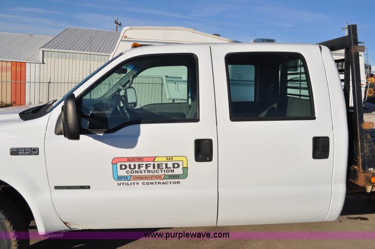 image for item C3129 2002 Ford F350 XL Super Duty flatbed truck