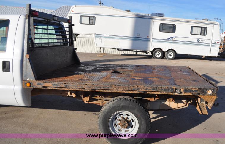 image for item C3129 2002 Ford F350 XL Super Duty flatbed truck