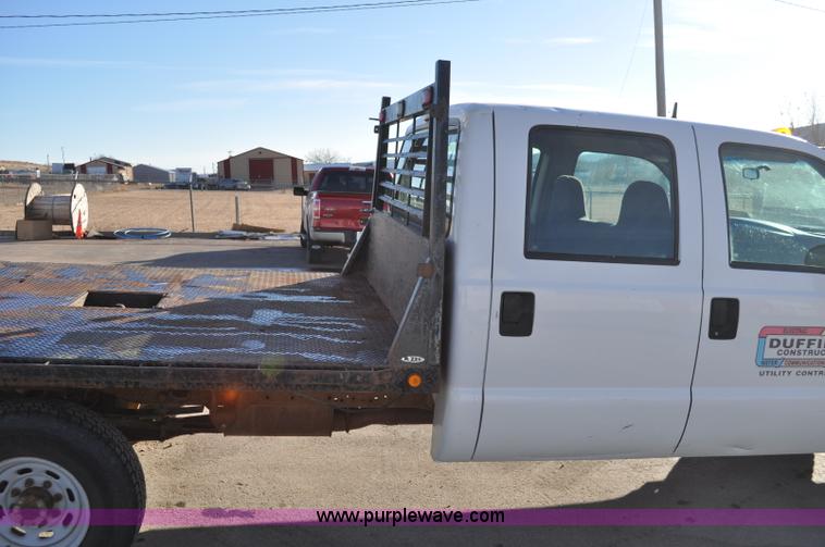 image for item C3129 2002 Ford F350 XL Super Duty flatbed truck