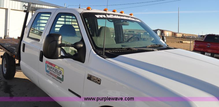 image for item C3129 2002 Ford F350 XL Super Duty flatbed truck