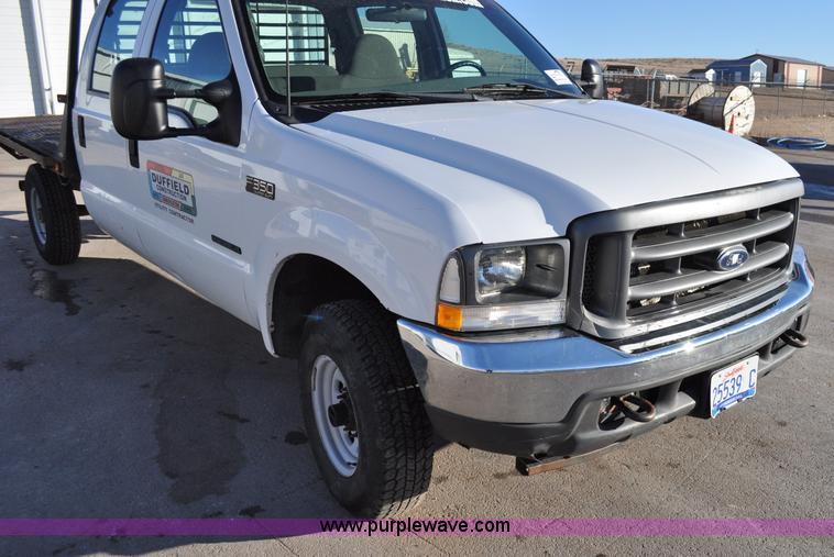 image for item C3129 2002 Ford F350 XL Super Duty flatbed truck