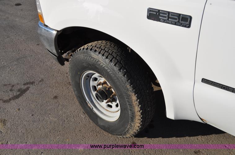 image for item C3129 2002 Ford F350 XL Super Duty flatbed truck