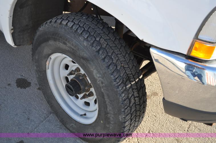 image for item C3129 2002 Ford F350 XL Super Duty flatbed truck