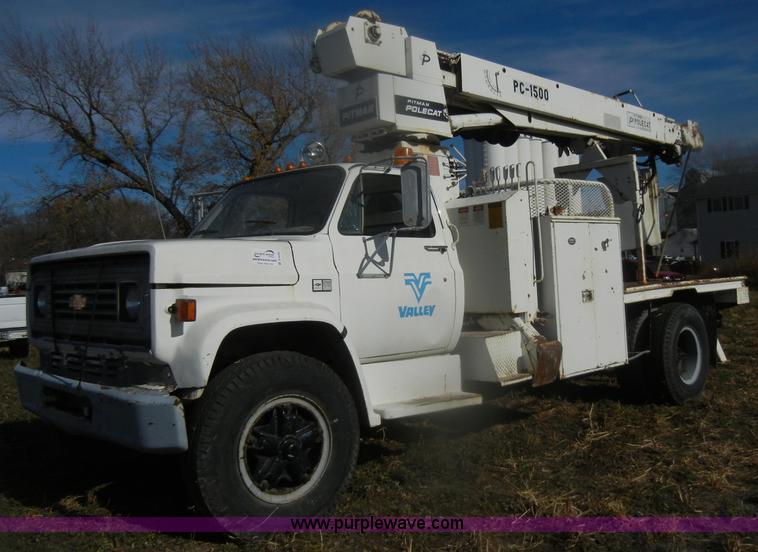 image for item D4702 1983 Chevrolet Kodiak C70 Pitman Polecat flatbed truck