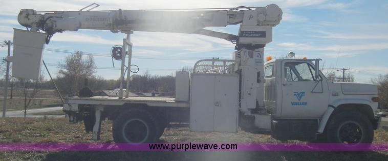 image for item D4702 1983 Chevrolet Kodiak C70 Pitman Polecat flatbed truck