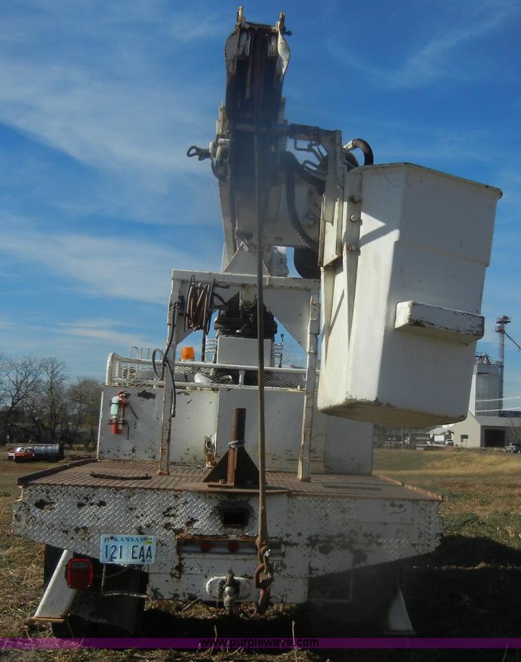 image for item D4702 1983 Chevrolet Kodiak C70 Pitman Polecat flatbed truck