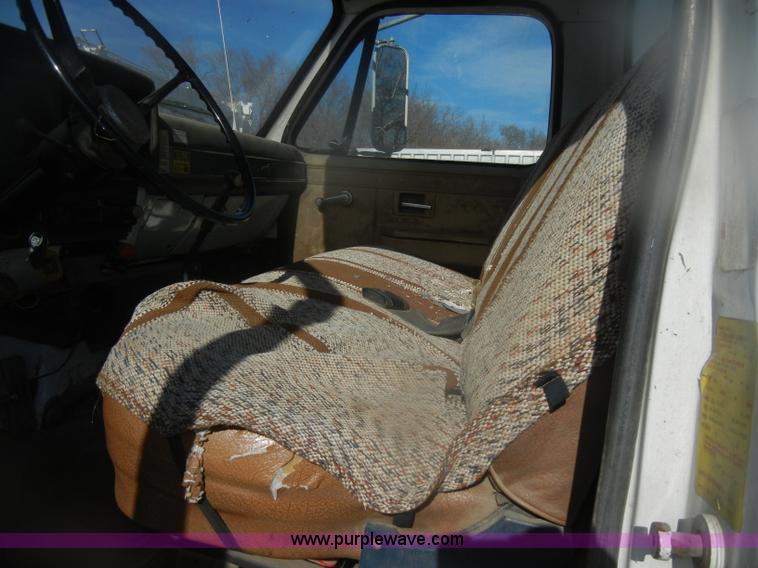 image for item D4702 1983 Chevrolet Kodiak C70 Pitman Polecat flatbed truck