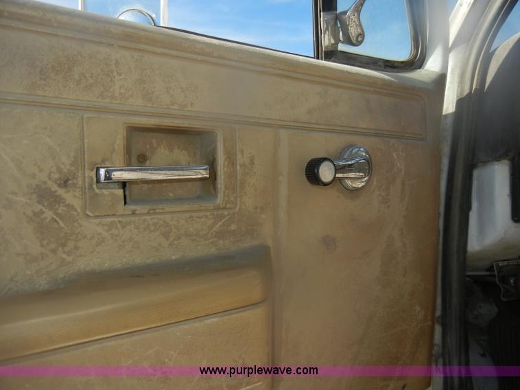 image for item D4702 1983 Chevrolet Kodiak C70 Pitman Polecat flatbed truck