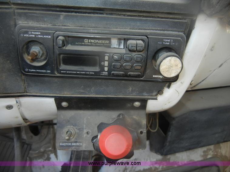 image for item D4702 1983 Chevrolet Kodiak C70 Pitman Polecat flatbed truck