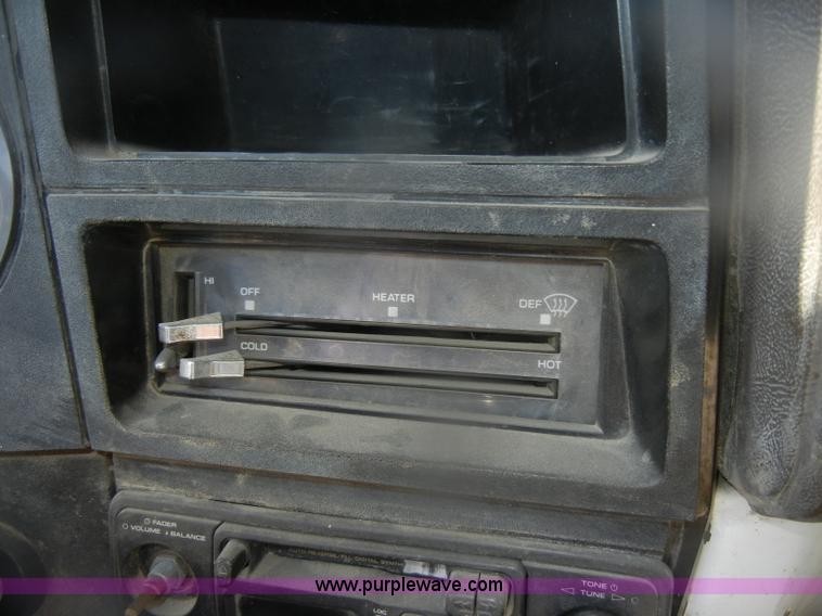 image for item D4702 1983 Chevrolet Kodiak C70 Pitman Polecat flatbed truck