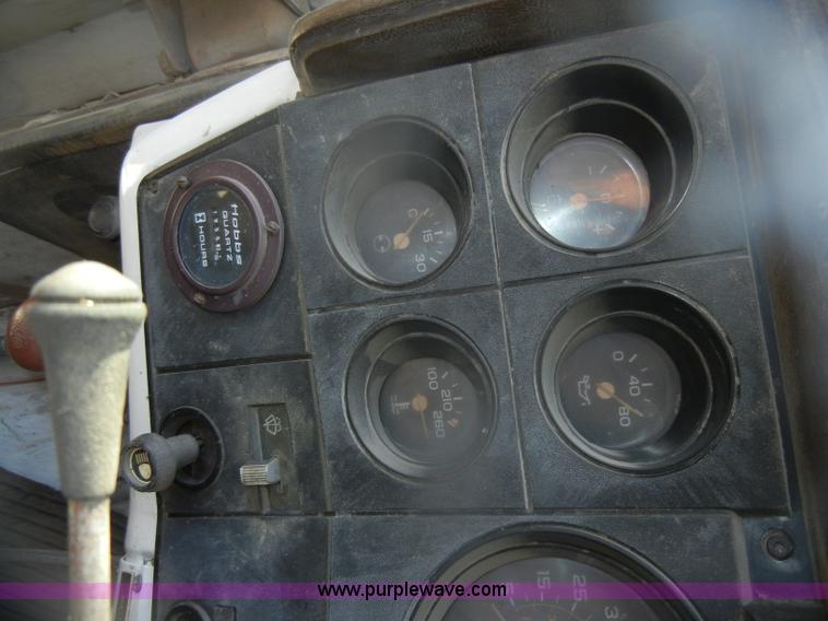 image for item D4702 1983 Chevrolet Kodiak C70 Pitman Polecat flatbed truck