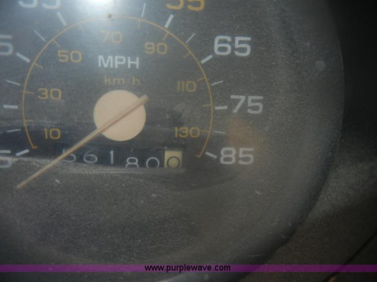 image for item D4702 1983 Chevrolet Kodiak C70 Pitman Polecat flatbed truck