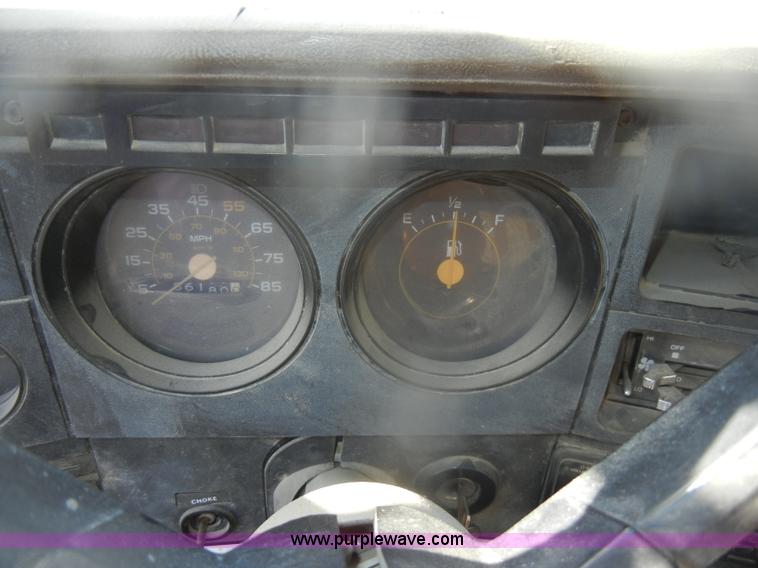 image for item D4702 1983 Chevrolet Kodiak C70 Pitman Polecat flatbed truck