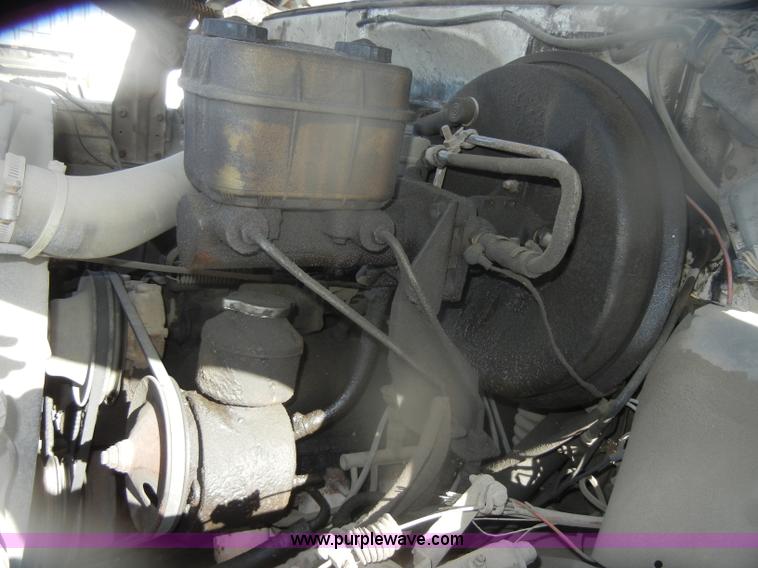 image for item D4702 1983 Chevrolet Kodiak C70 Pitman Polecat flatbed truck