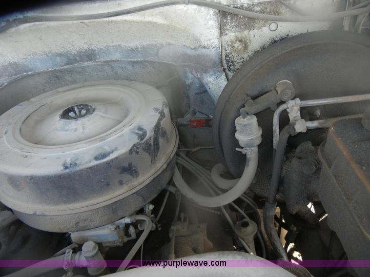 image for item D4702 1983 Chevrolet Kodiak C70 Pitman Polecat flatbed truck