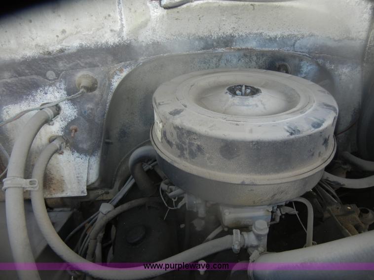 image for item D4702 1983 Chevrolet Kodiak C70 Pitman Polecat flatbed truck