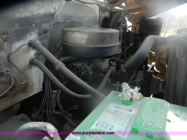 image for item D4702 1983 Chevrolet Kodiak C70 Pitman Polecat flatbed truck