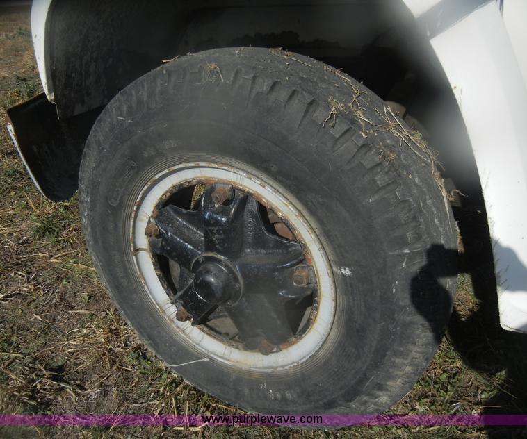 image for item D4702 1983 Chevrolet Kodiak C70 Pitman Polecat flatbed truck