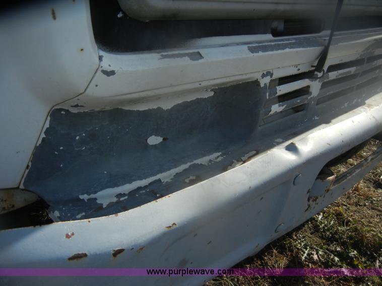 image for item D4702 1983 Chevrolet Kodiak C70 Pitman Polecat flatbed truck