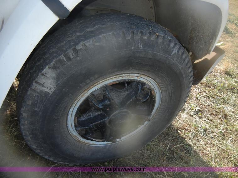 image for item D4702 1983 Chevrolet Kodiak C70 Pitman Polecat flatbed truck