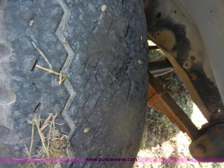 image for item D4702 1983 Chevrolet Kodiak C70 Pitman Polecat flatbed truck