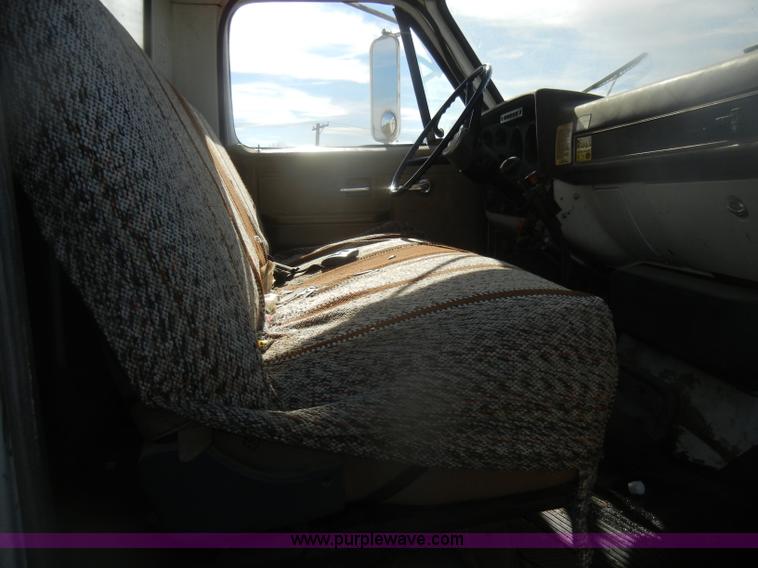 image for item D4702 1983 Chevrolet Kodiak C70 Pitman Polecat flatbed truck