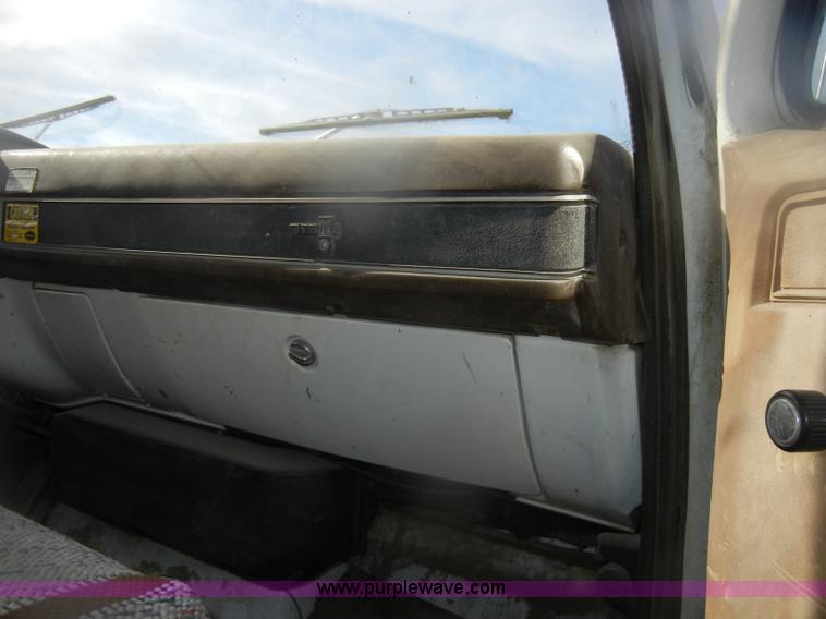 image for item D4702 1983 Chevrolet Kodiak C70 Pitman Polecat flatbed truck