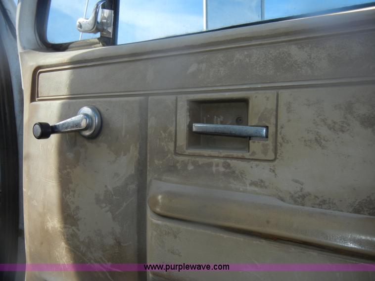 image for item D4702 1983 Chevrolet Kodiak C70 Pitman Polecat flatbed truck