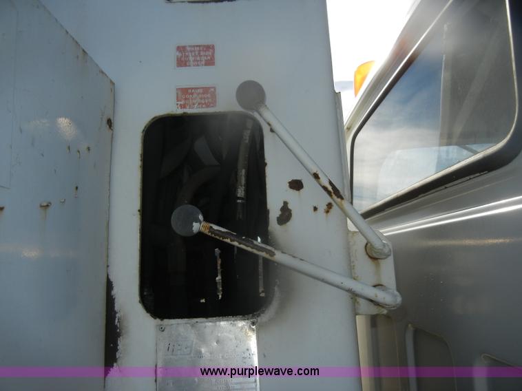 image for item D4702 1983 Chevrolet Kodiak C70 Pitman Polecat flatbed truck