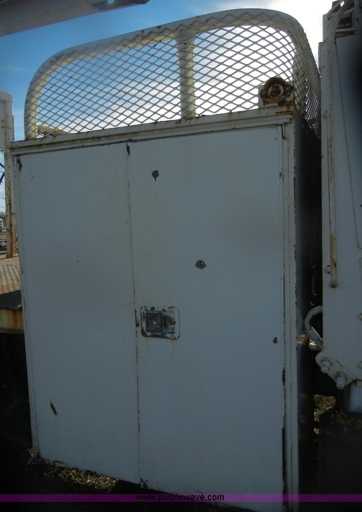 image for item D4702 1983 Chevrolet Kodiak C70 Pitman Polecat flatbed truck