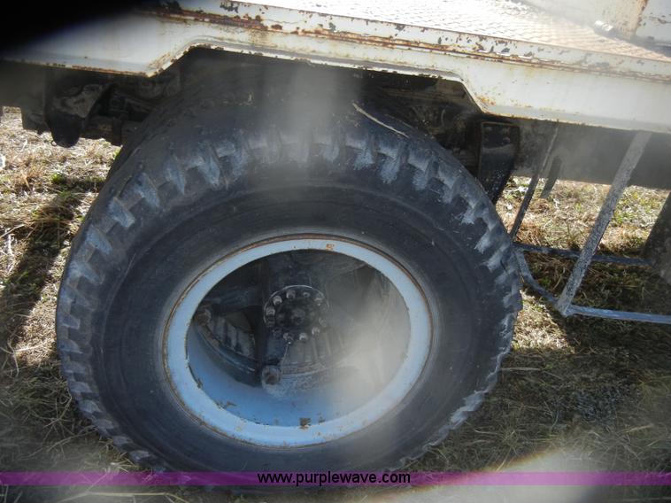 image for item D4702 1983 Chevrolet Kodiak C70 Pitman Polecat flatbed truck