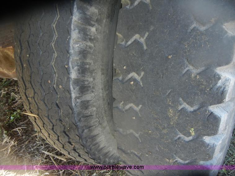 image for item D4702 1983 Chevrolet Kodiak C70 Pitman Polecat flatbed truck