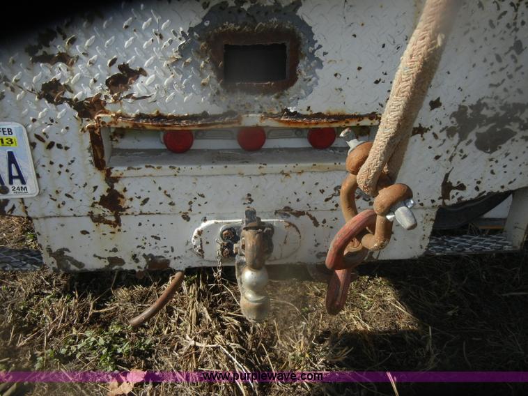 image for item D4702 1983 Chevrolet Kodiak C70 Pitman Polecat flatbed truck