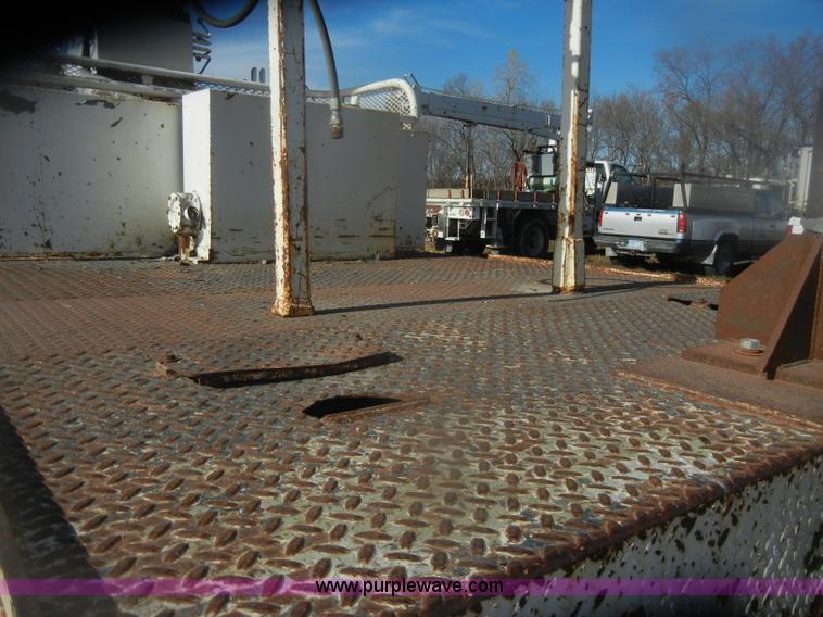 image for item D4702 1983 Chevrolet Kodiak C70 Pitman Polecat flatbed truck