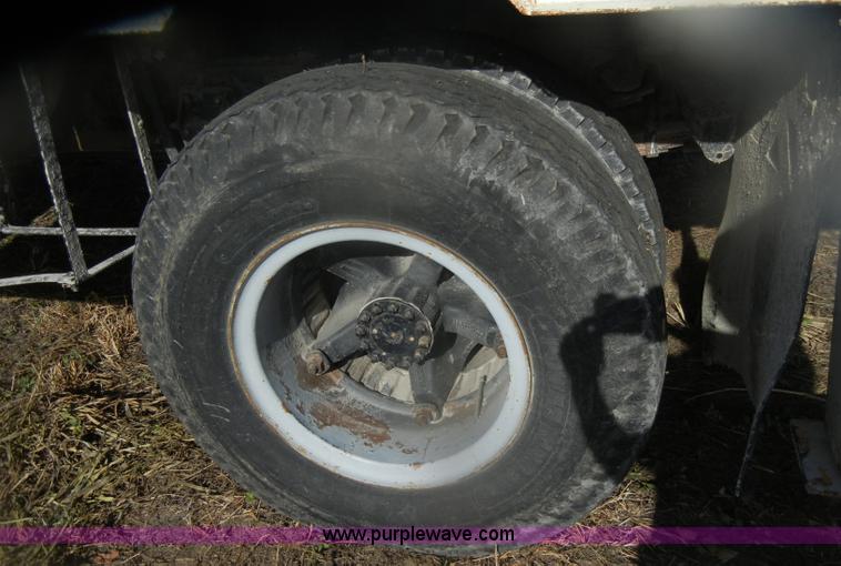 image for item D4702 1983 Chevrolet Kodiak C70 Pitman Polecat flatbed truck