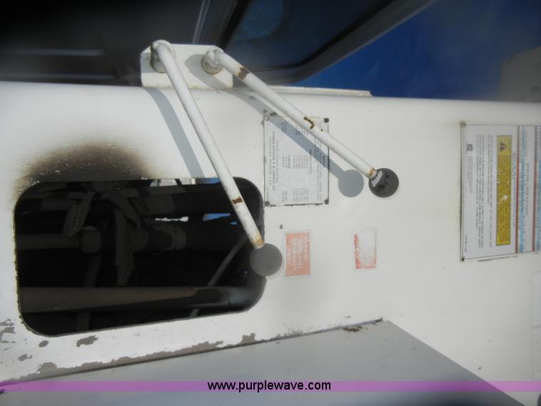 image for item D4702 1983 Chevrolet Kodiak C70 Pitman Polecat flatbed truck