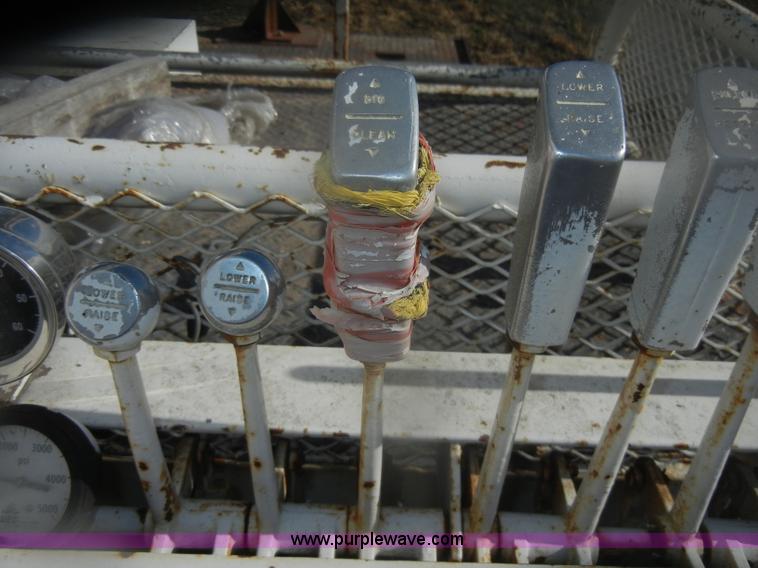 image for item D4702 1983 Chevrolet Kodiak C70 Pitman Polecat flatbed truck