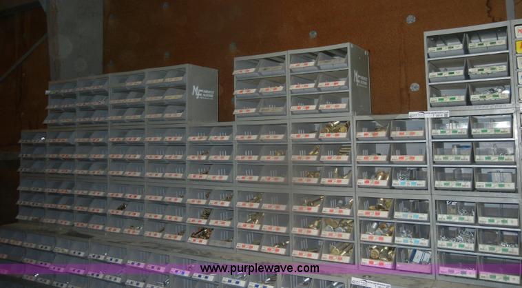 image for item T9516 (10) rows of assorted Grade 8 bolts, screws, nuts, and washers