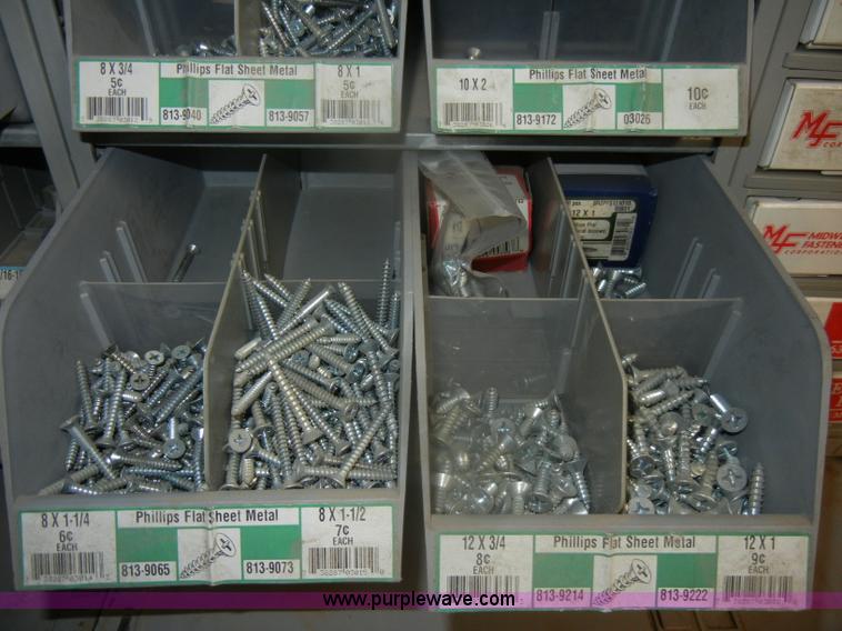 image for item T9516 (10) rows of assorted Grade 8 bolts, screws, nuts, and washers